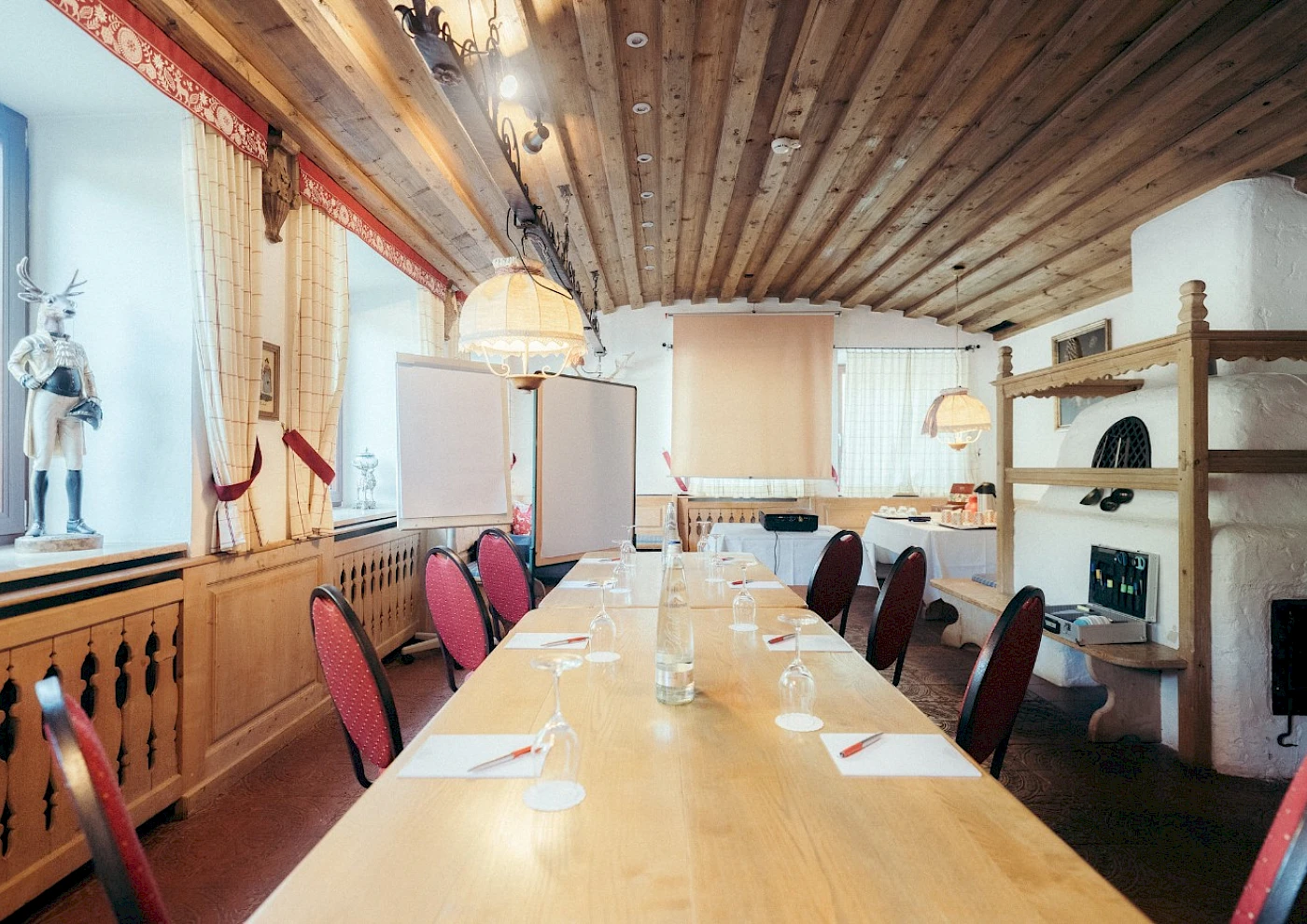 Terrace seating with views of Lake Schliersee and the mountains
