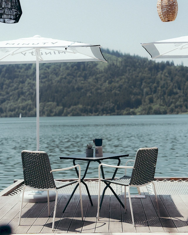 Terrace seating with views of Lake Schliersee and the mountains